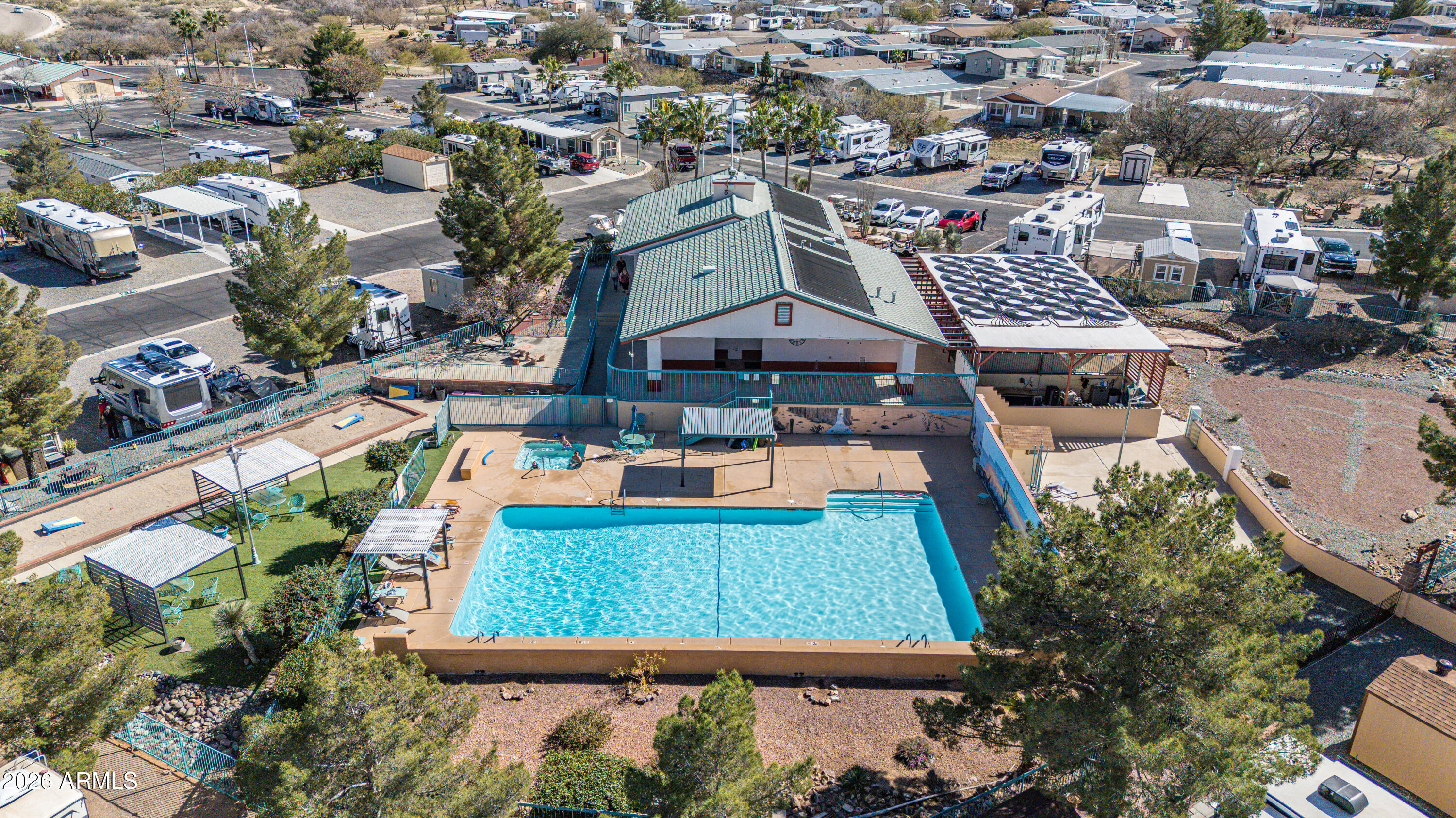 1030 Barrel Cactus Ridge, Unit 198 Benson, AZ 85602 - Photo 10 of 15 an aerial view of residential houses with yard