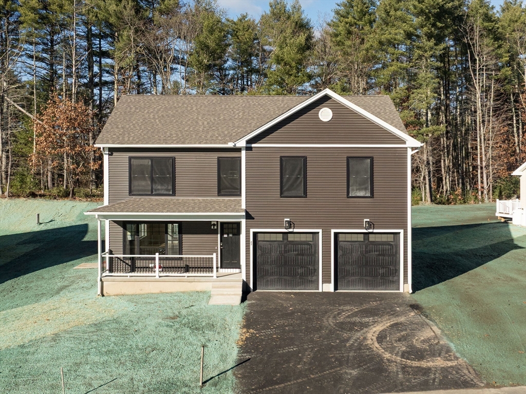 23 High Blf Road Belchertown, MA 01007 - Photo 1 of 39 front view of a house with a yard
