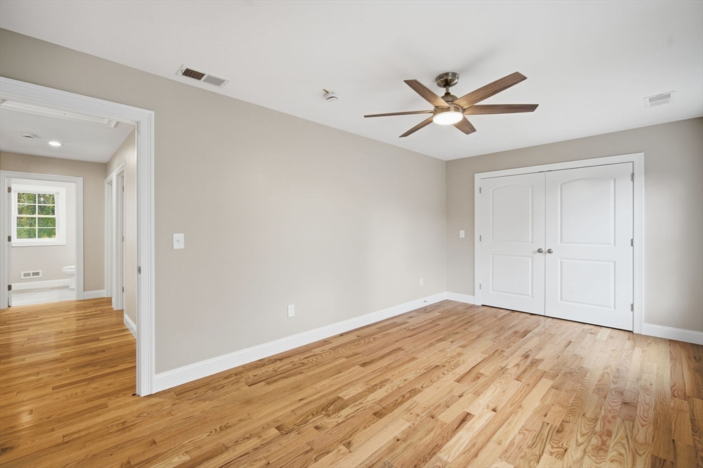 23 High Blf Road Belchertown, MA 01007 - Photo 18 of 39 a view of an empty room with wooden floor