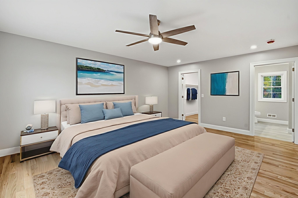 23 High Blf Road Belchertown, MA 01007 - Photo 26 of 39 a spacious bedroom with a bed and a chandelier