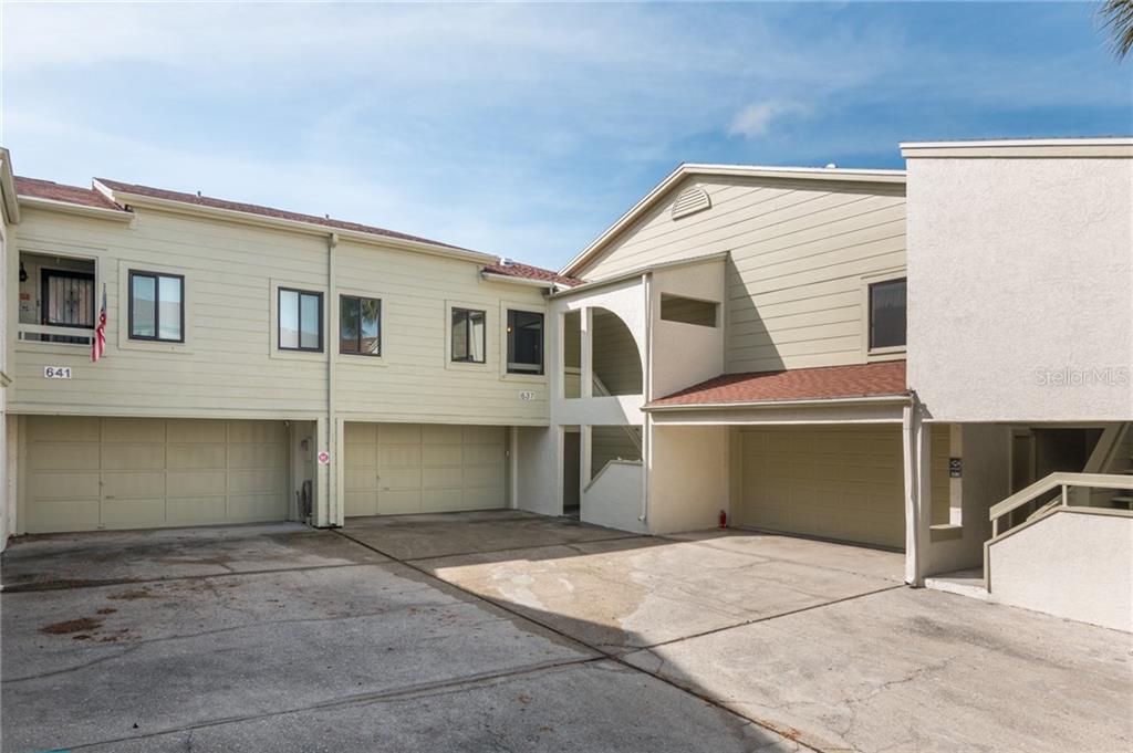 Unit 637 is at the center of this photo and has an oversized 2 car garage.