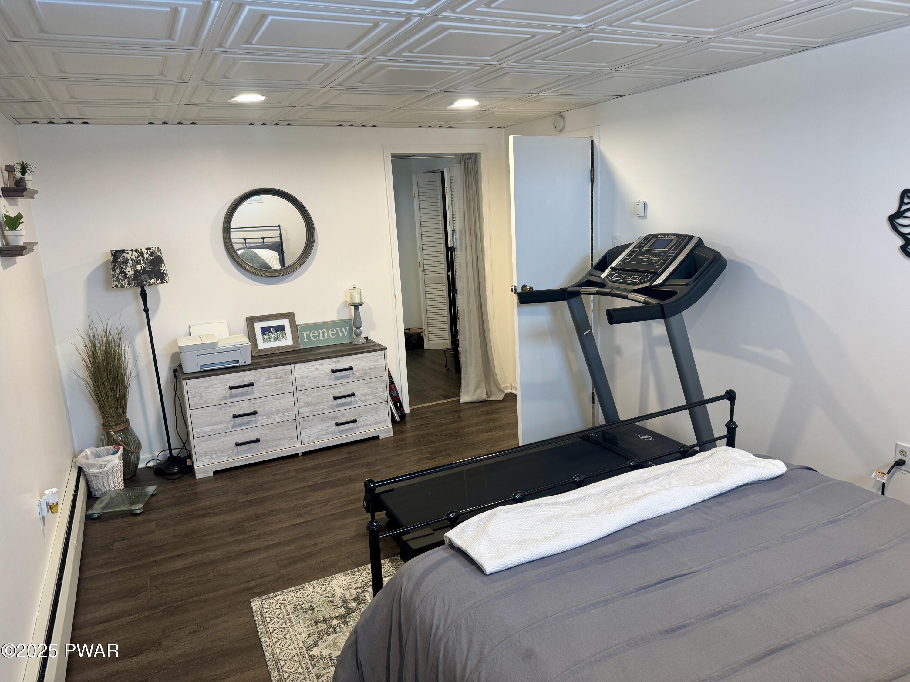 360 South Baker Road Waymart, PA 18472 - Photo 27 of 35 a bedroom with a bed and a mirror