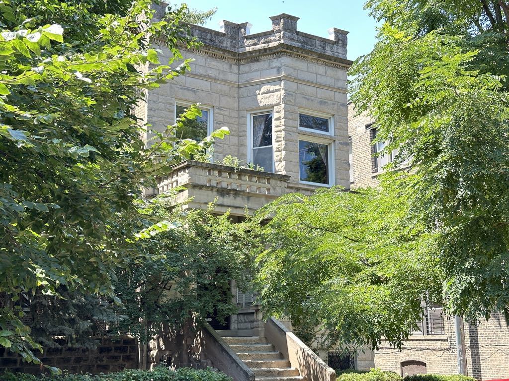 3832 North Fremont Street, Unit G Chicago, IL 60613 - Photo 1 of 20 a view of a house with a tree