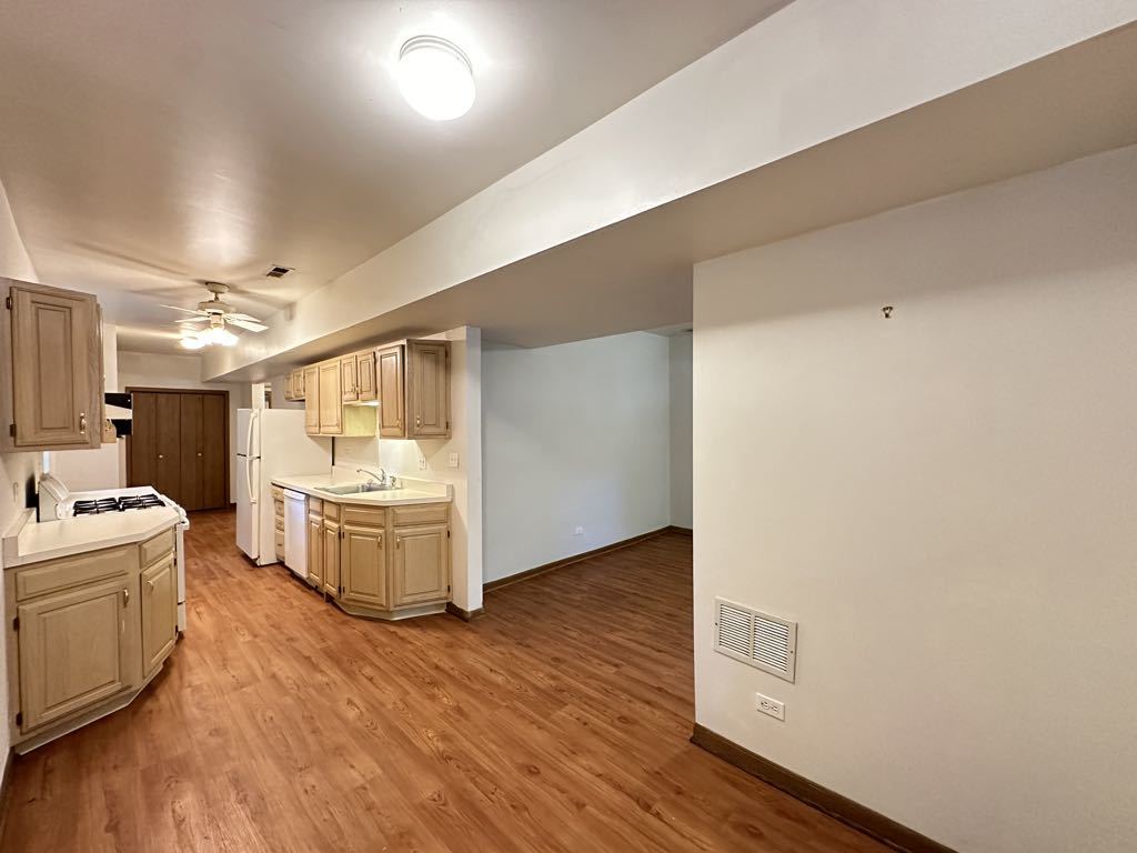 3832 North Fremont Street, Unit G Chicago, IL 60613 - Photo 7 of 20 a room with storage and utility