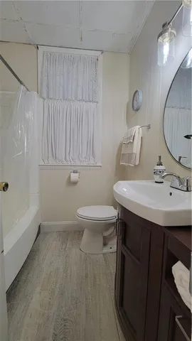 a room with chairs and windows