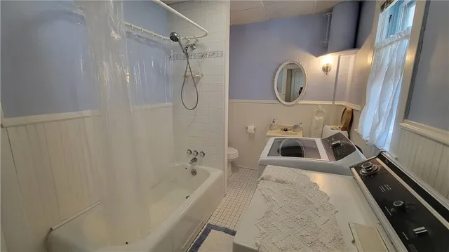 a view of a balcony with wooden floor