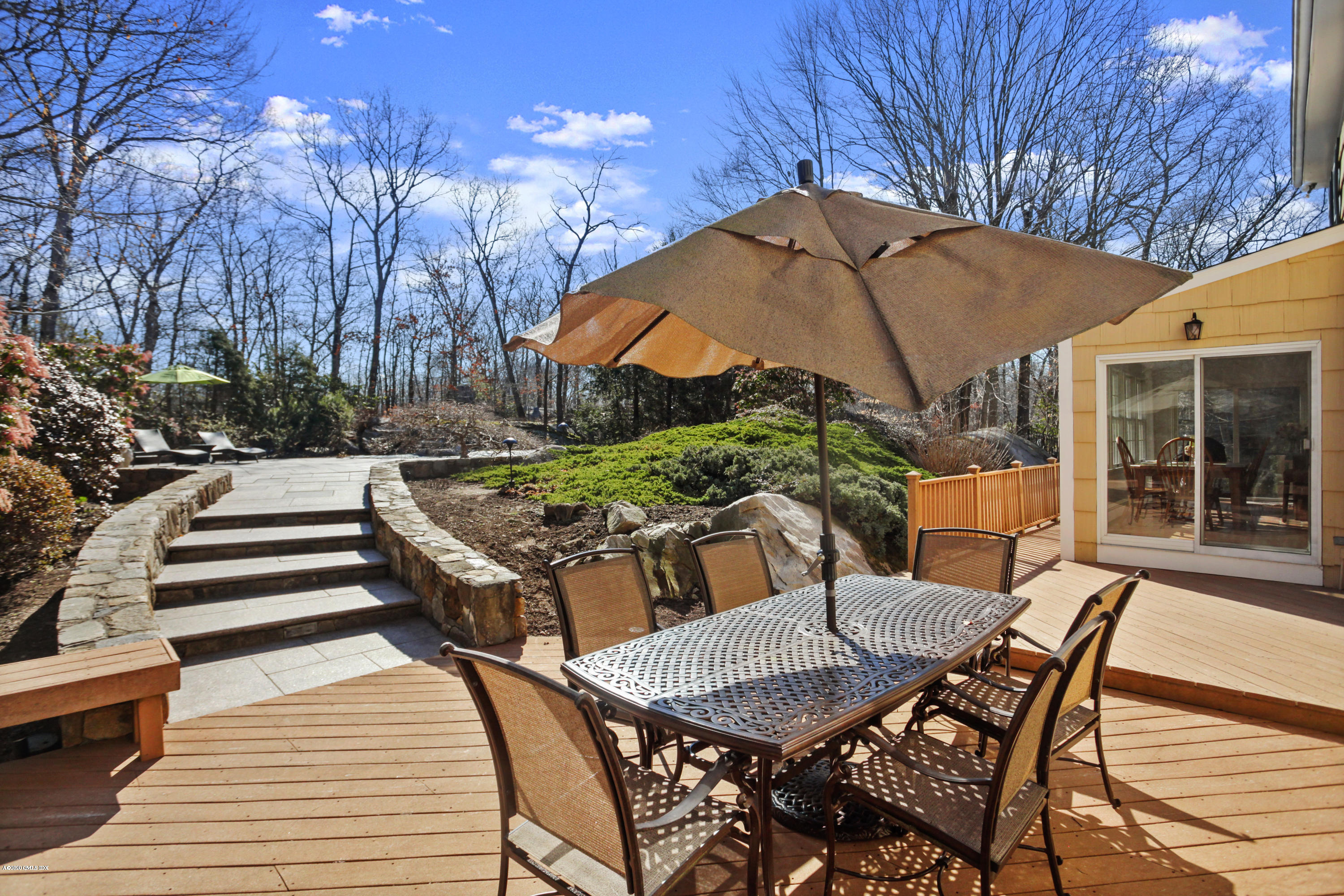 31 Horseshoe Road Cos Cob, CT 06807 - Photo 32 of 34 deck with table and path to pool