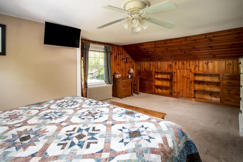 15 County Road East Freetown, MA 02717 - Photo 21 of 36 a bed room with a bed and a television