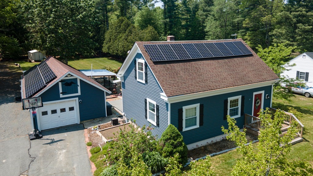 15 County Road East Freetown, MA 02717 - Photo 3 of 36 a aerial view of a house with swimming pool and trees