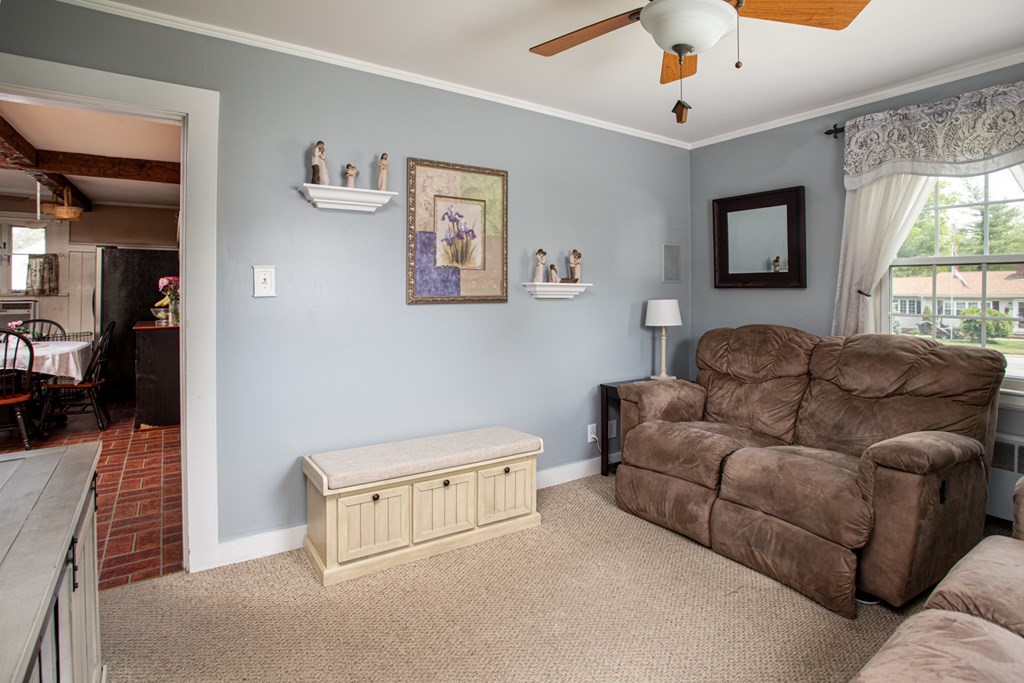 15 County Road East Freetown, MA 02717 - Photo 10 of 36 a living room with furniture and a window