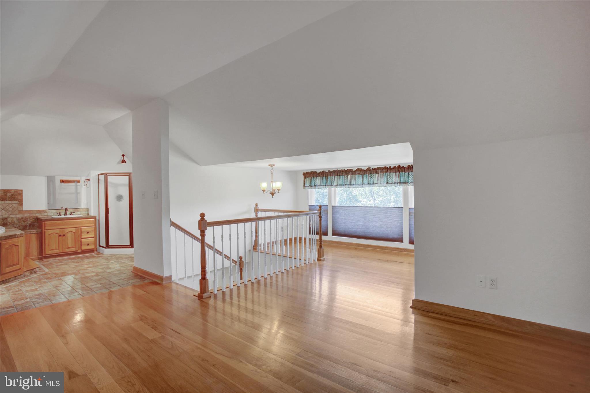 98 Peach Glen Road Gardners, PA 17324 - Photo 38 of 85 a view of an empty room with wooden floor