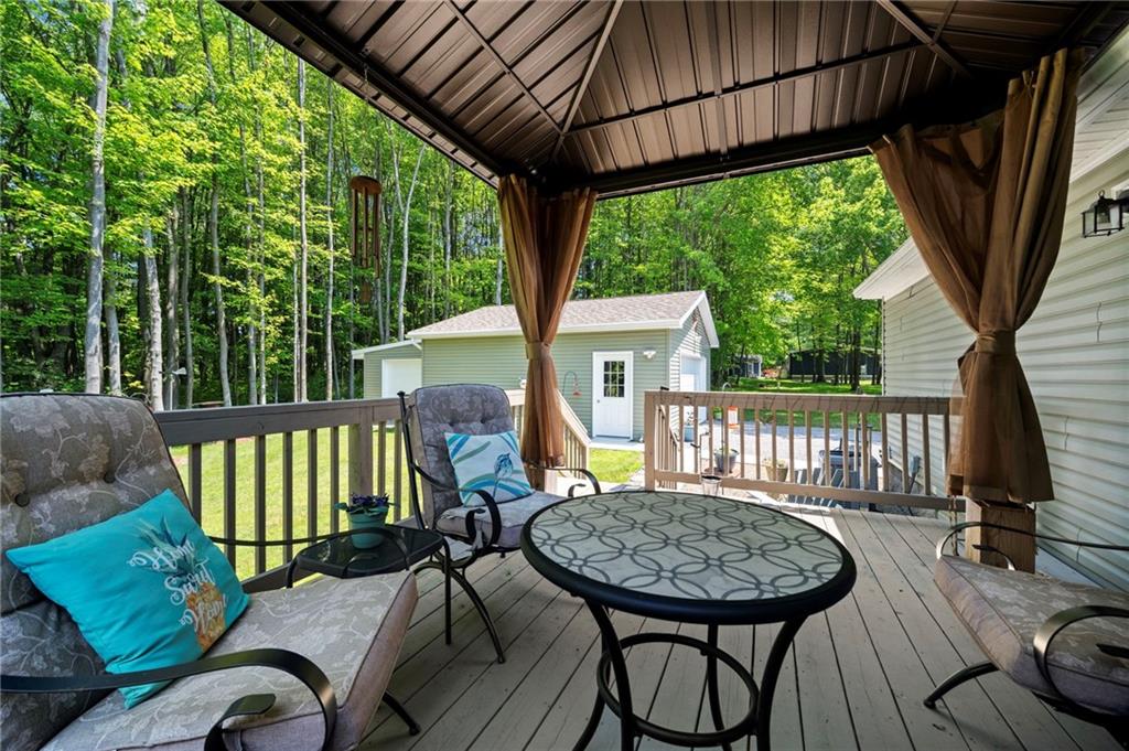 73 South Summit Road, Unit 510 Greenville, PA 16125 - Photo 29 of 33 a view of balcony with a patio and wooden floor