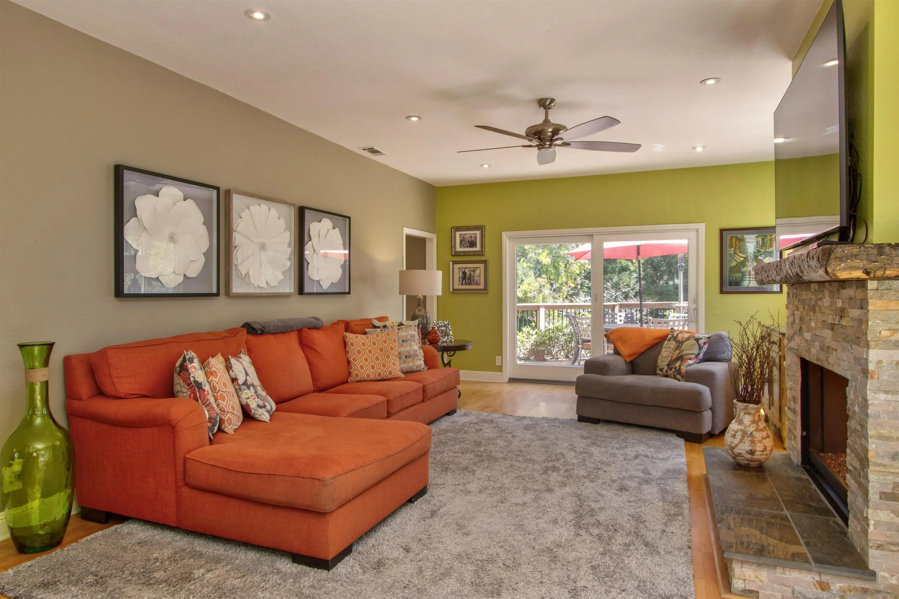 1041 Solana Drive Del Mar, CA 92014 - Photo 15 of 44 a living room with fireplace furniture and a flat screen tv