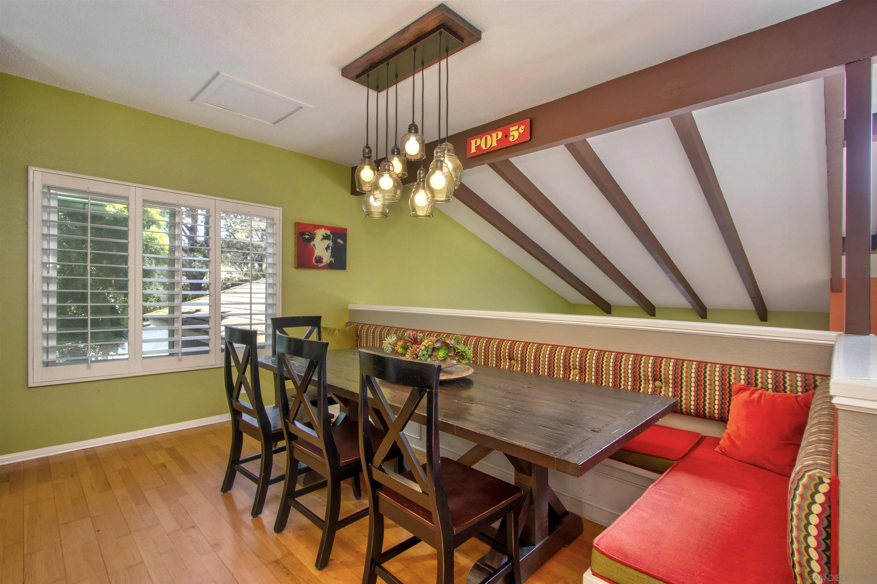 1041 Solana Drive Del Mar, CA 92014 - Photo 19 of 44 a view of a dining room with furniture and a chandelier