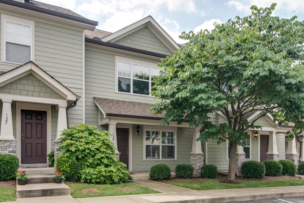 553 Rosedale Avenue, Unit 127 Nashville, TN 37211 - Photo 1 of 27 a front view of a house with plants and trees