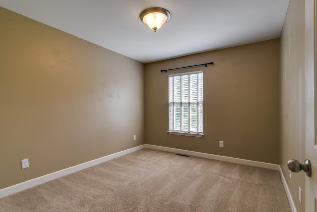 553 Rosedale Avenue, Unit 127 Nashville, TN 37211 - Photo 14 of 27 an empty room with windows and closet