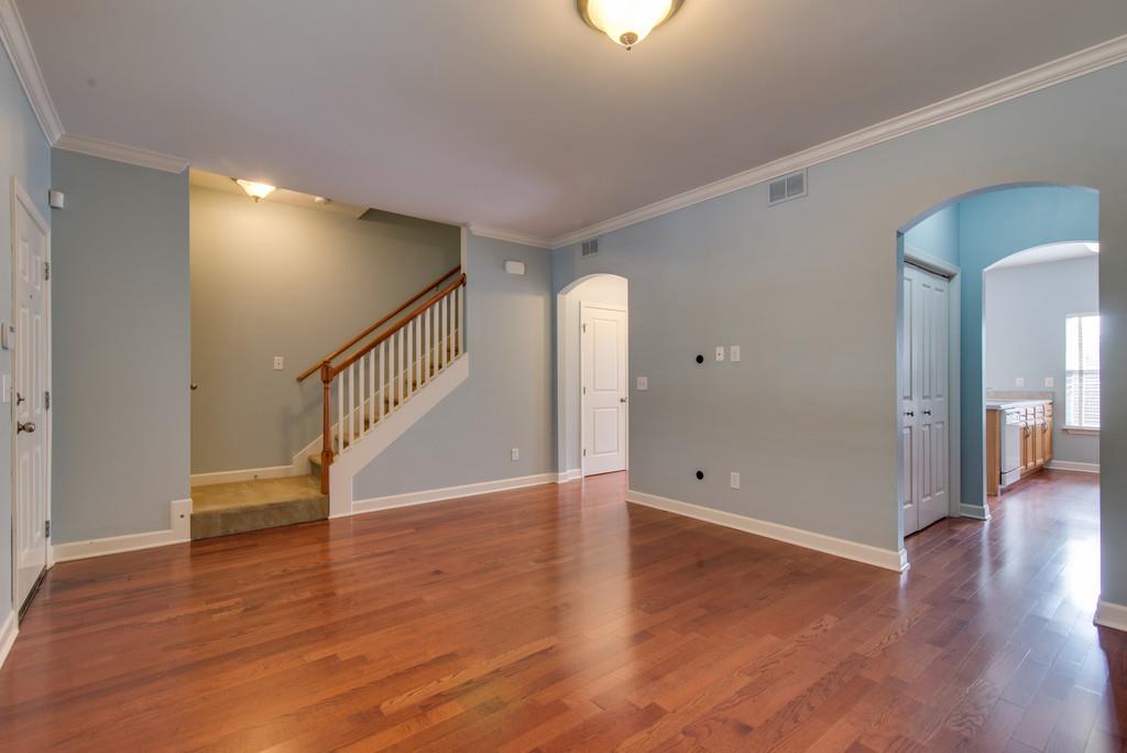 553 Rosedale Avenue, Unit 127 Nashville, TN 37211 - Photo 6 of 27 a view of an empty room with wooden floor