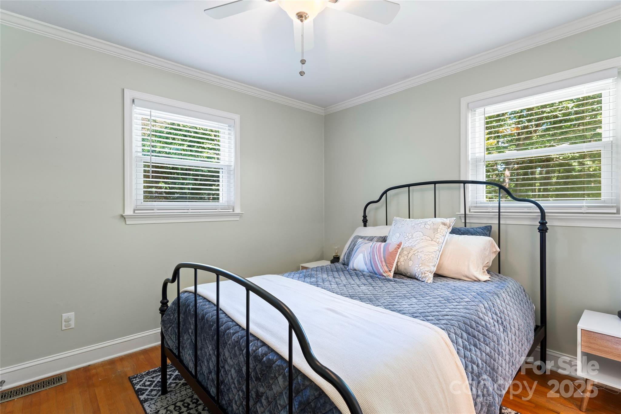14217 Phillips Road Matthews, NC 28105 - Photo 25 of 38 a bedroom with a large bed and a window