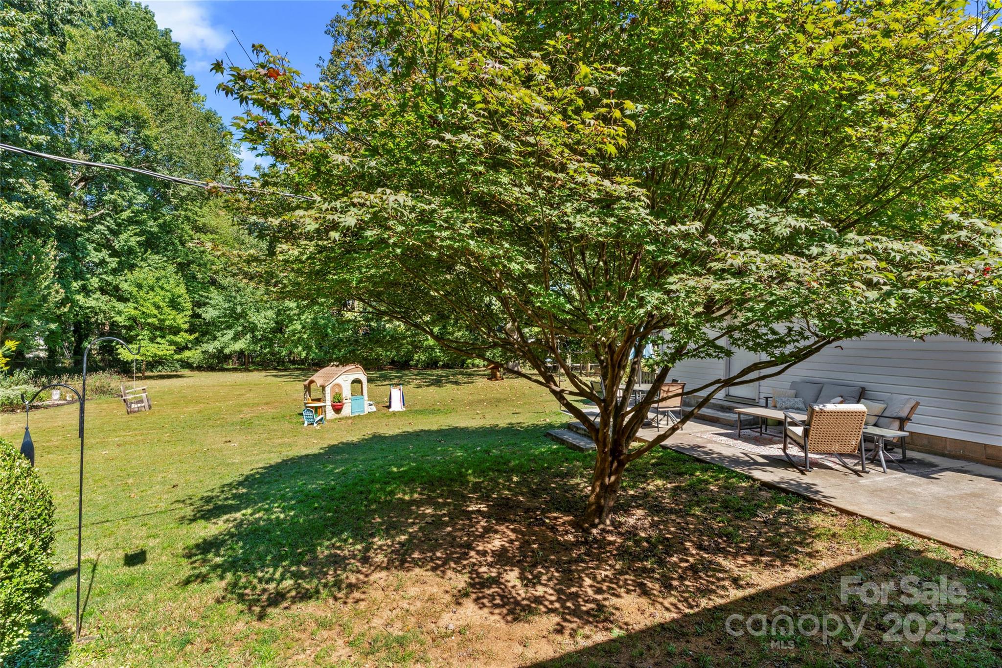 14217 Phillips Road Matthews, NC 28105 - Photo 29 of 38 a view of a lake with a tree