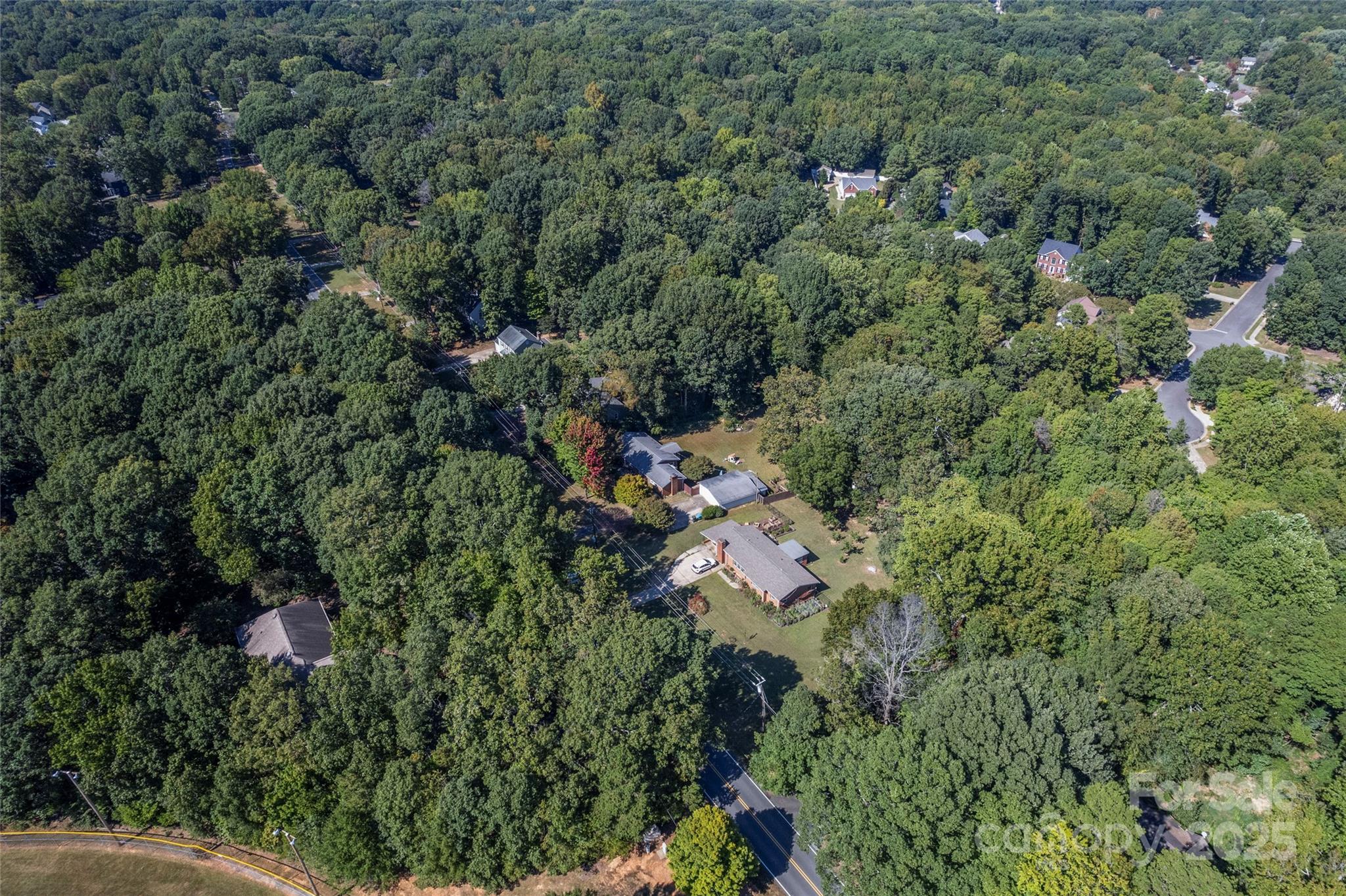 14217 Phillips Road Matthews, NC 28105 - Photo 35 of 38 an aerial view of a house with a yard