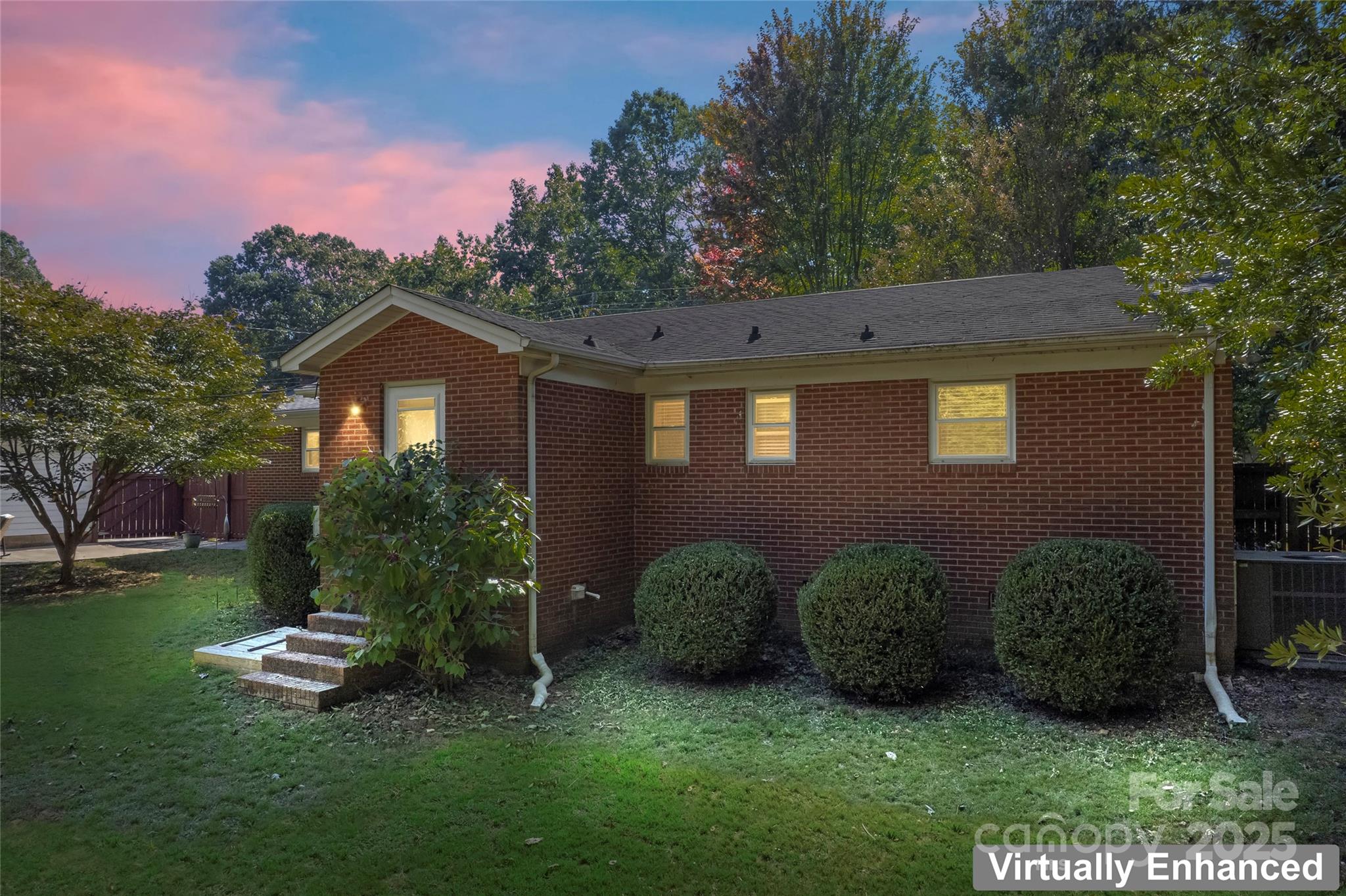 14217 Phillips Road Matthews, NC 28105 - Photo 38 of 38 a view of a garden with a house in the background