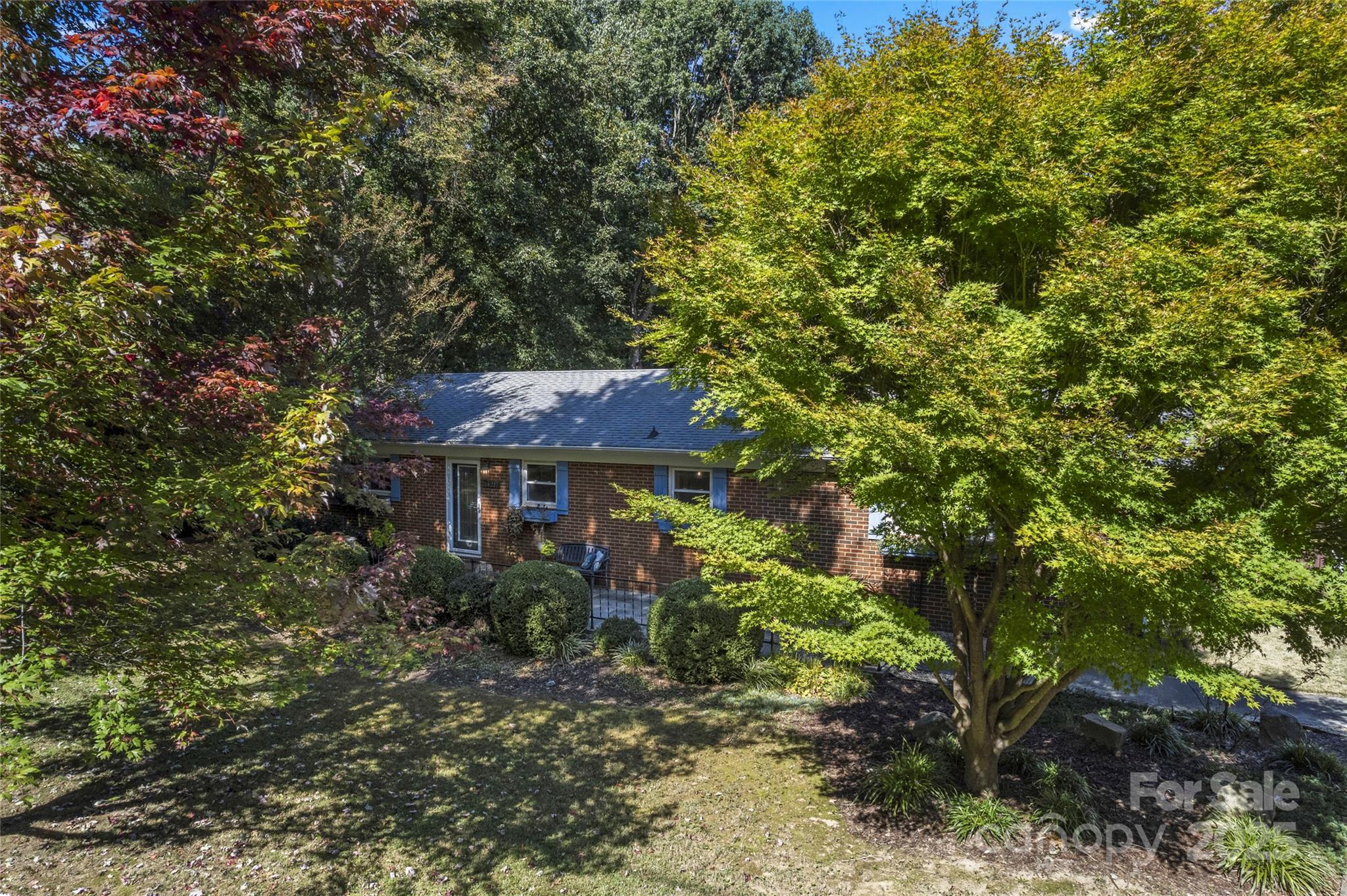 14217 Phillips Road Matthews, NC 28105 - Photo 5 of 38 a view of a house with a tree