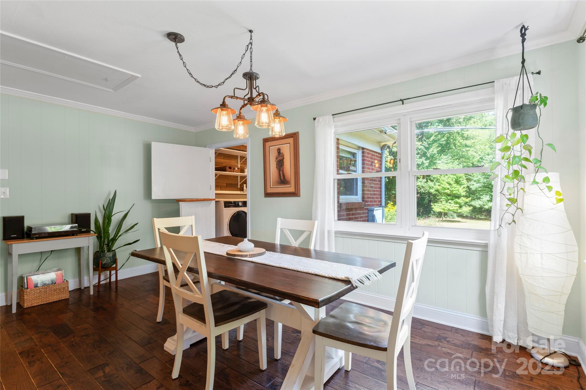 14217 Phillips Road Matthews, NC 28105 - Photo 10 of 38 a view of a dining room with furniture window and wooden floor