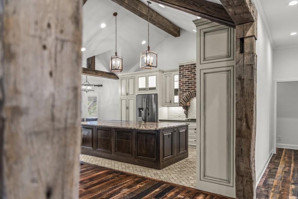 300 Potts Lane Covington, GA 30016 - Photo 16 of 76 a view of dinning room and chandelier