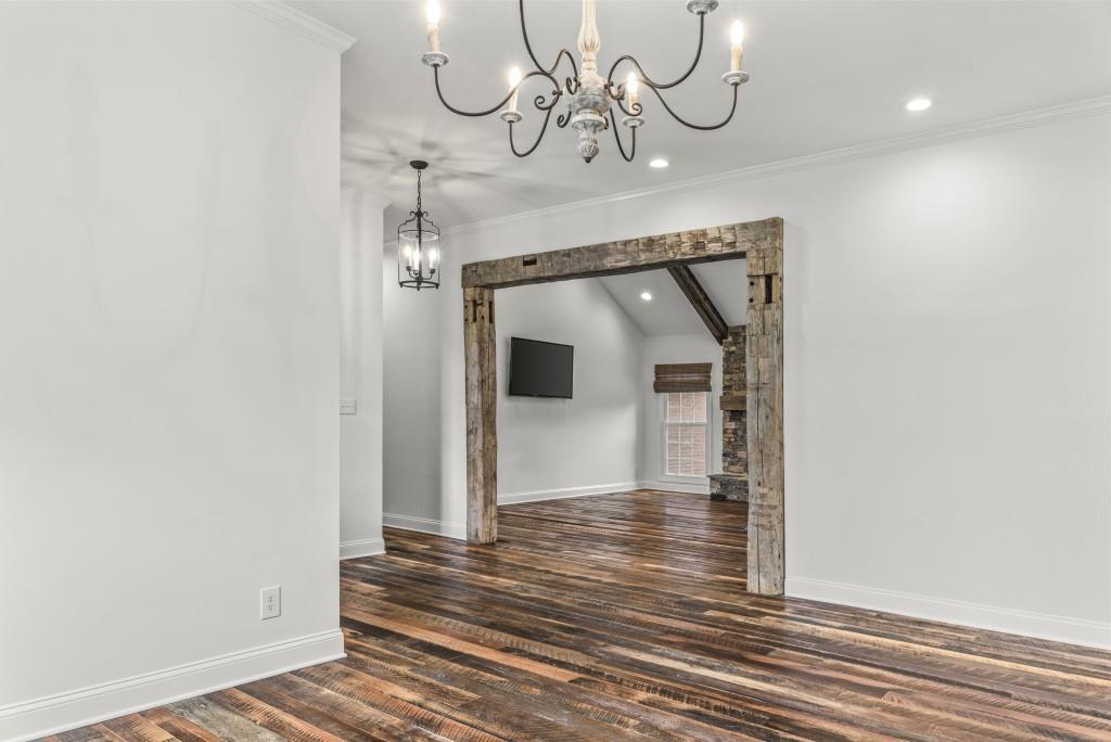 300 Potts Lane Covington, GA 30016 - Photo 22 of 76 a view of a hallway with wooden floor