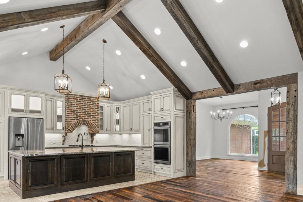 300 Potts Lane Covington, GA 30016 - Photo 32 of 76 a open kitchen with a sink and cabinets
