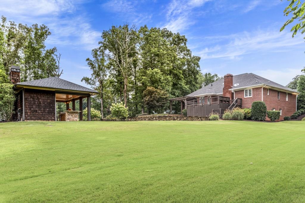 300 Potts Lane Covington, GA 30016 - Photo 59 of 76 a front view of a house with a garden