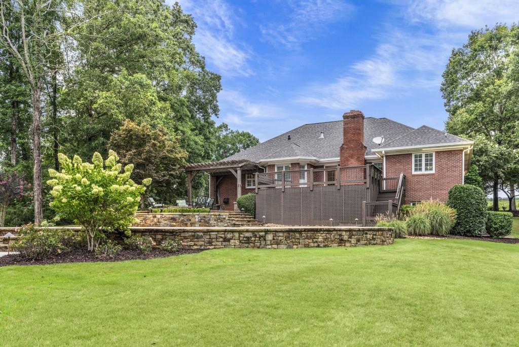 300 Potts Lane Covington, GA 30016 - Photo 60 of 76 a house view with a garden space