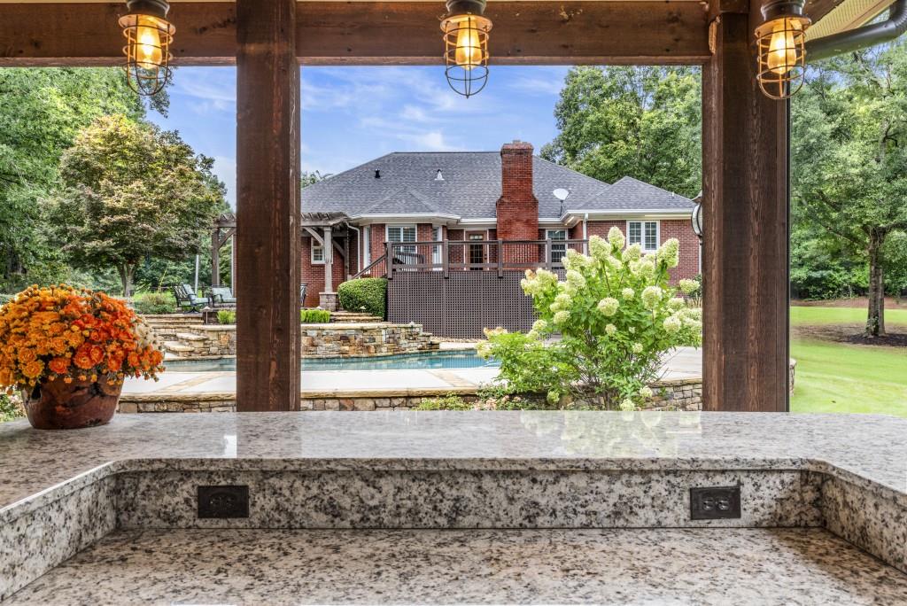 300 Potts Lane Covington, GA 30016 - Photo 61 of 76 a front view of a house with garden