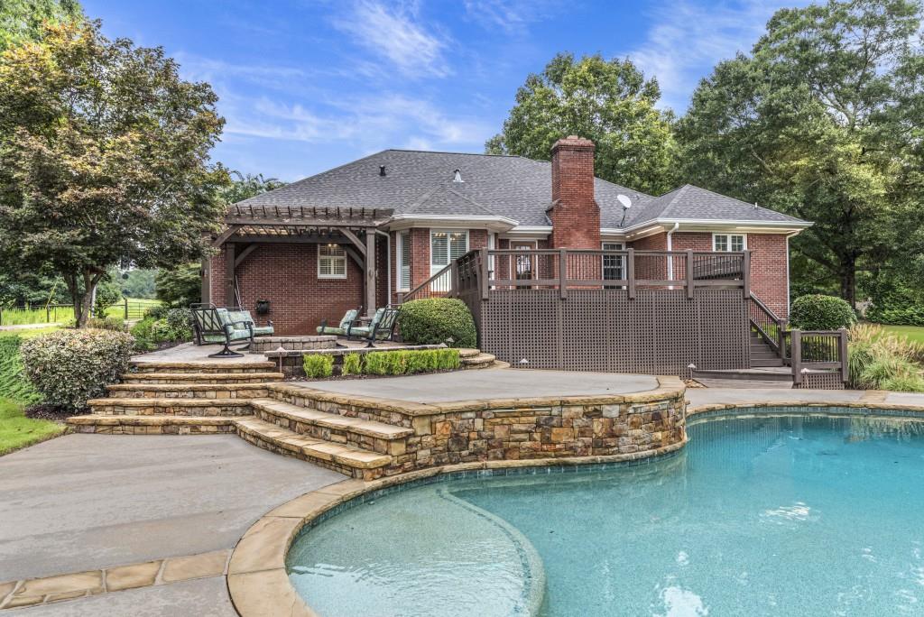 300 Potts Lane Covington, GA 30016 - Photo 69 of 76 a front view of a house with a yard