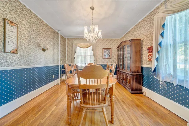 a bed room with furniture and a window