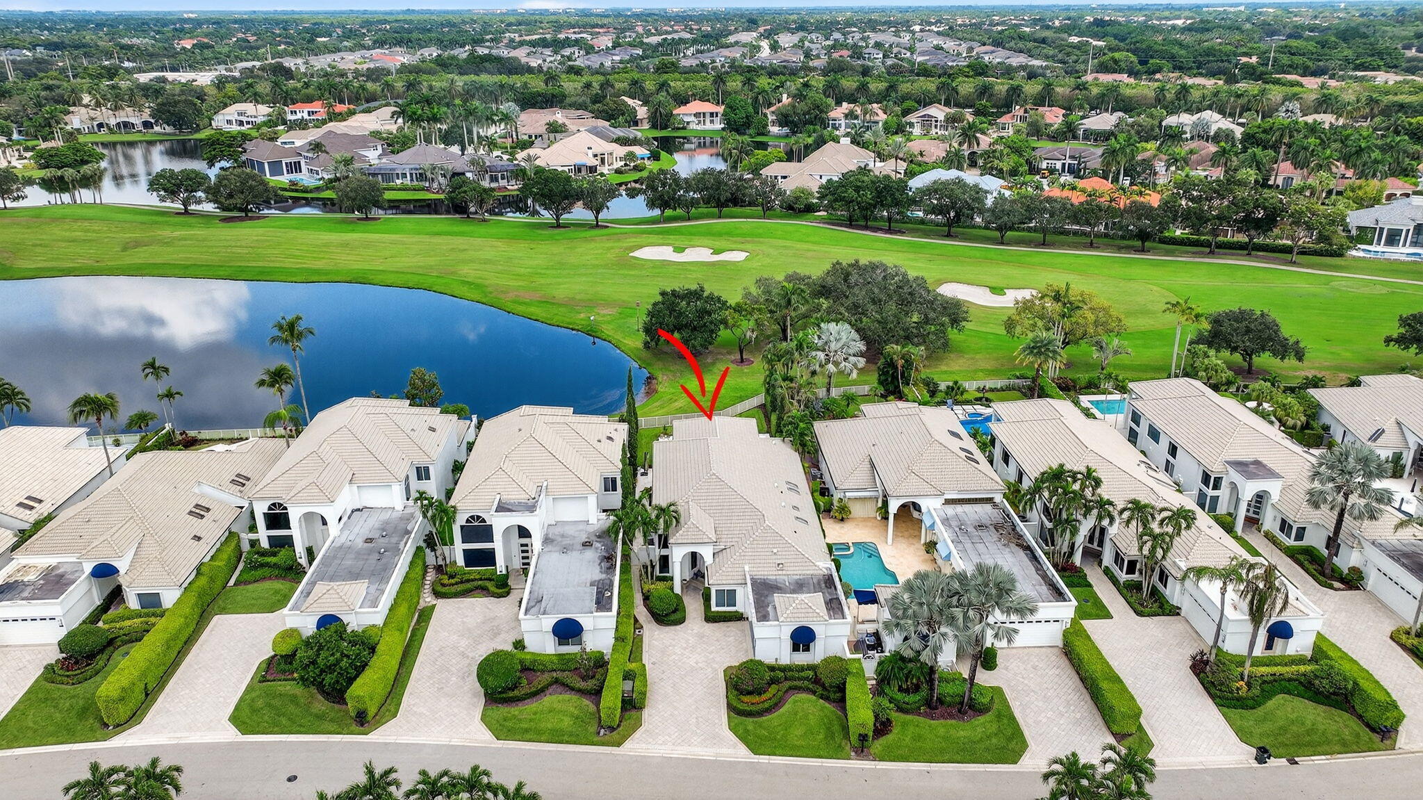 2563 Northwest 63rd Street Boca Raton, FL 33496 - Photo 62 of 65 an aerial view of multiple house