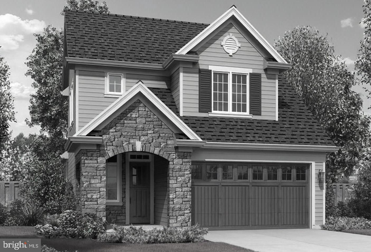 0 Pine Road Mohrsville, PA 19541 - Photo 1 of 2 a front view of a house with a yard and garage