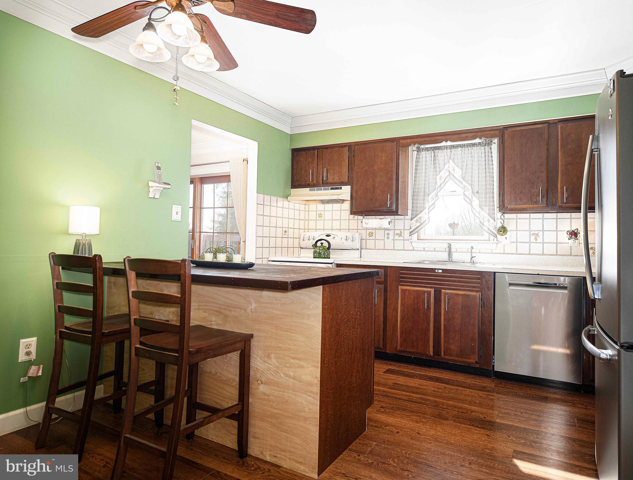 3204 Hunt Road Fallston, MD 21047 - Photo 14 of 54 a kitchen with a sink cabinets and window