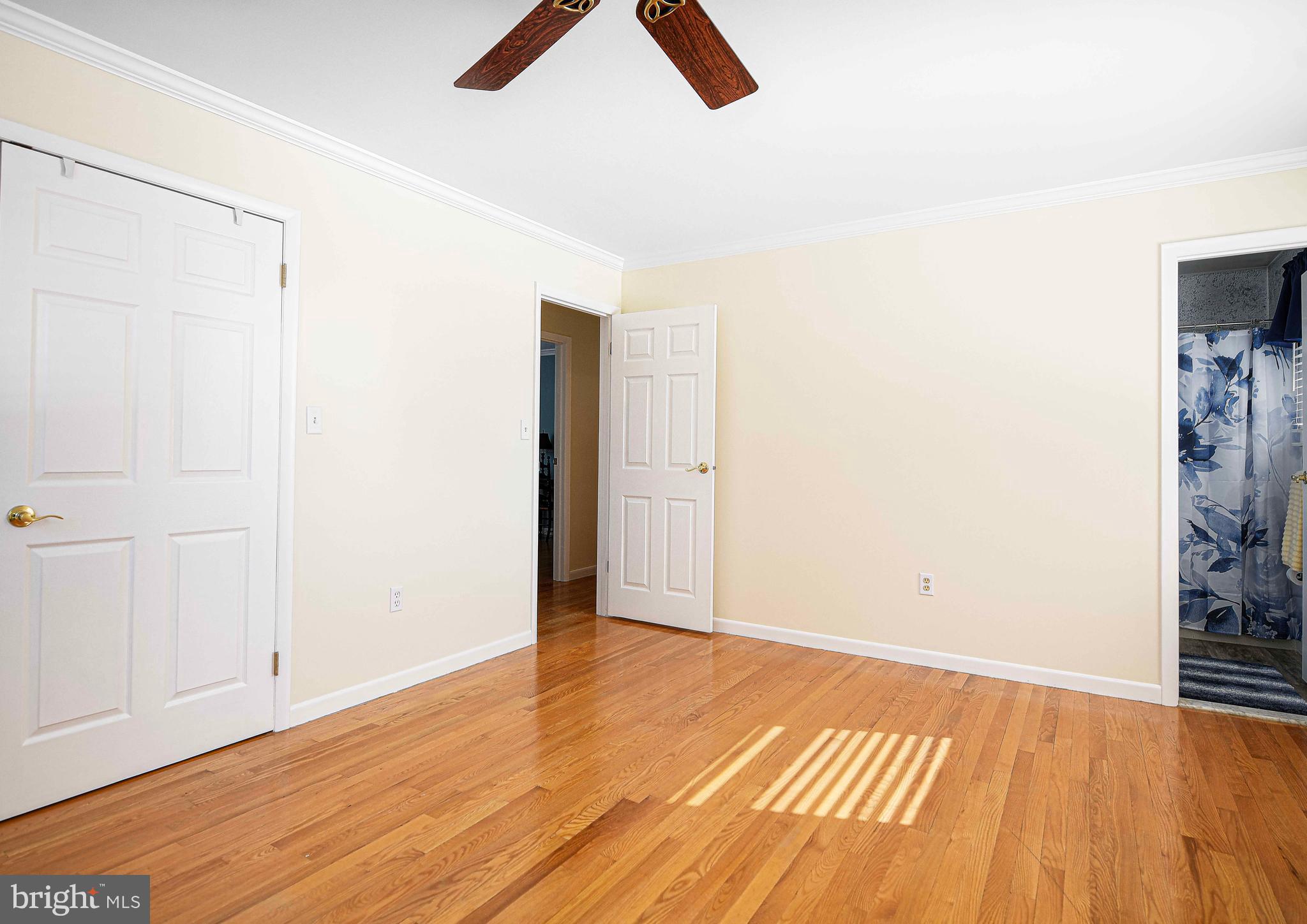 3204 Hunt Road Fallston, MD 21047 - Photo 20 of 54 an empty room with wooden floor and windows