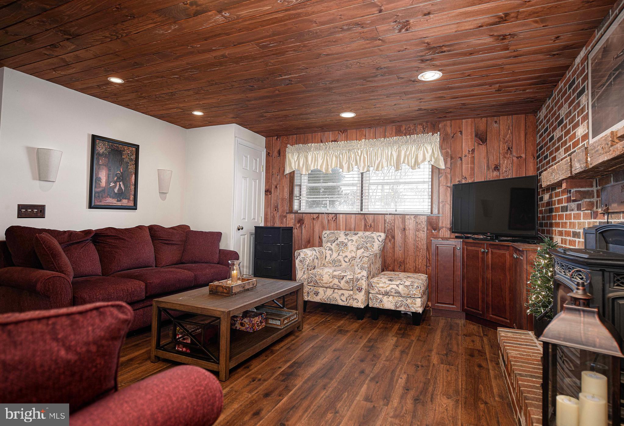 3204 Hunt Road Fallston, MD 21047 - Photo 28 of 54 a living room with furniture and a flat screen tv