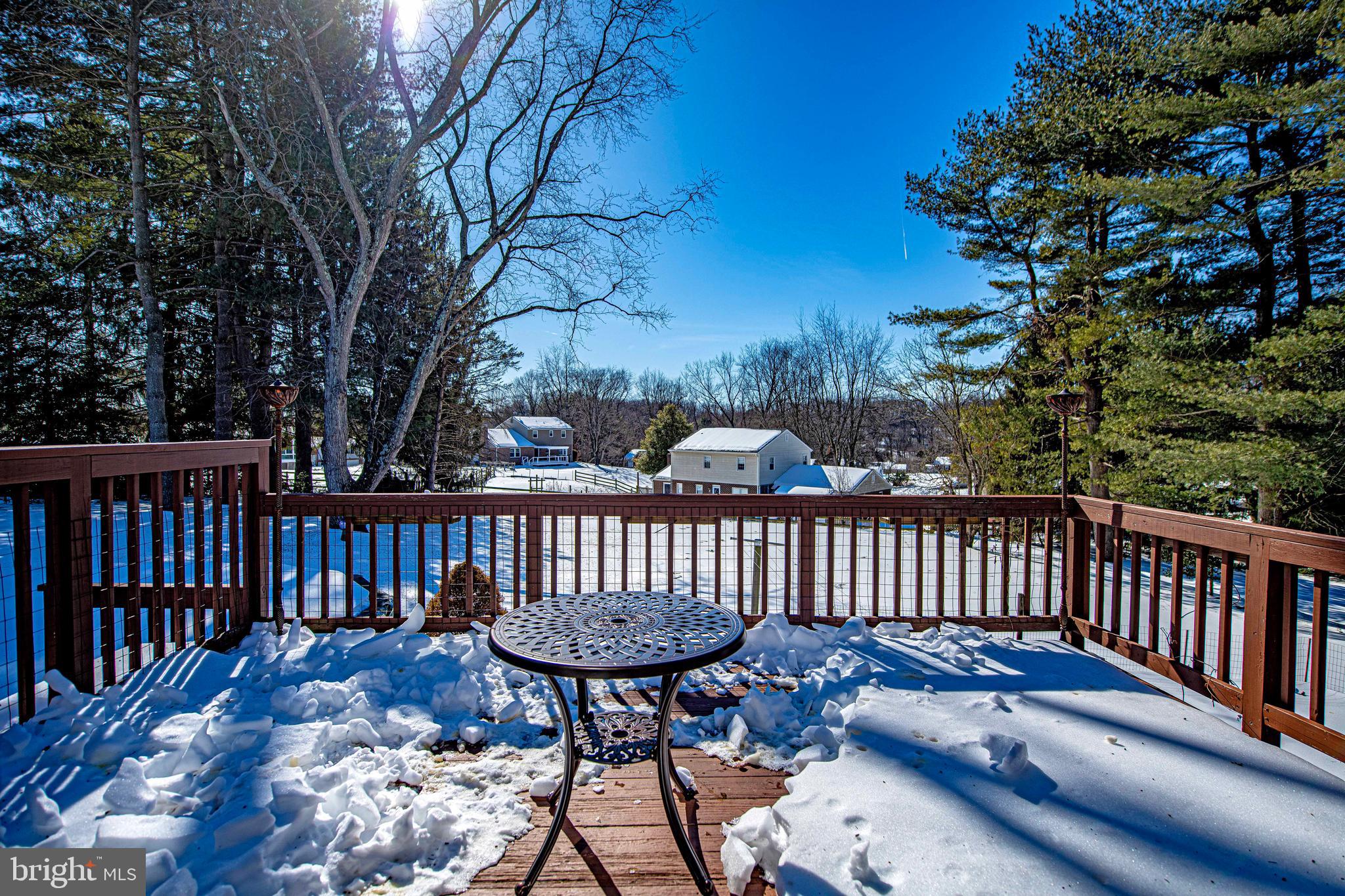 3204 Hunt Road Fallston, MD 21047 - Photo 36 of 54 a view of a chair in wooden deck