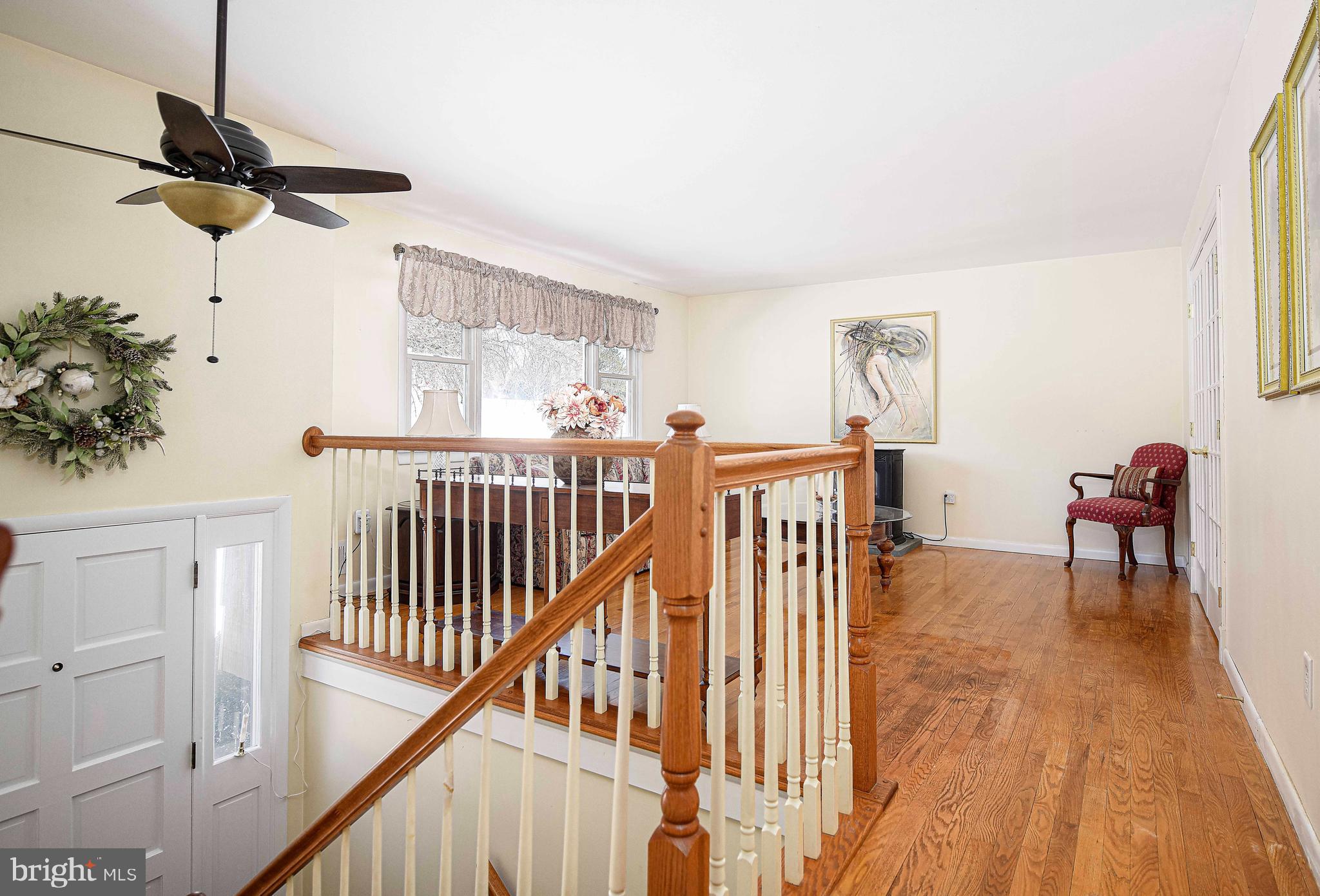 3204 Hunt Road Fallston, MD 21047 - Photo 7 of 54 a view of a hallway with wooden floor and staircase