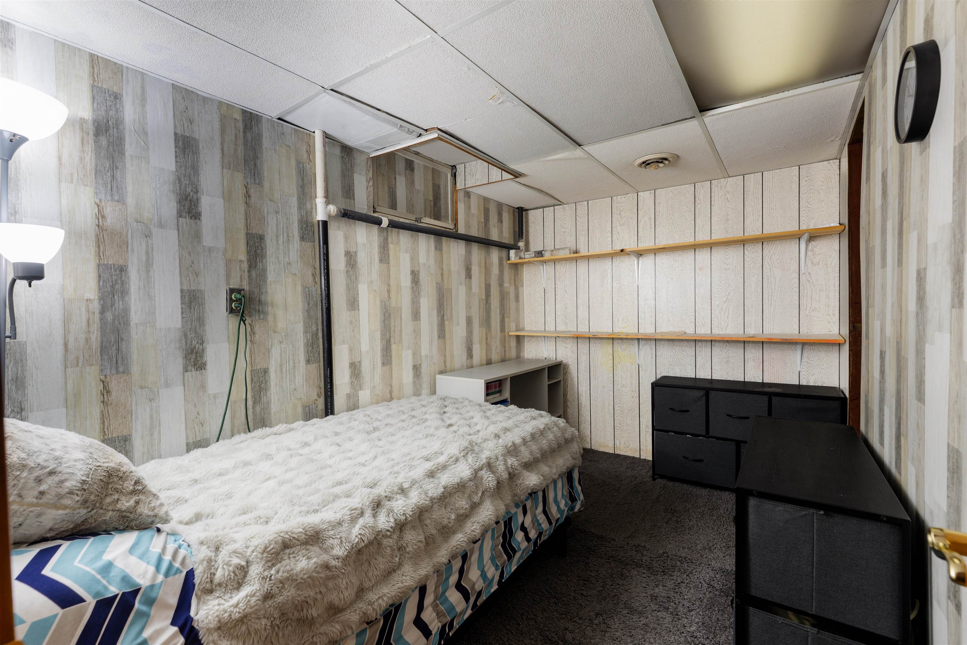 800 Monroe Street Hanover, IL 61041 - Photo 17 of 39 a bedroom with a bed window and a shower