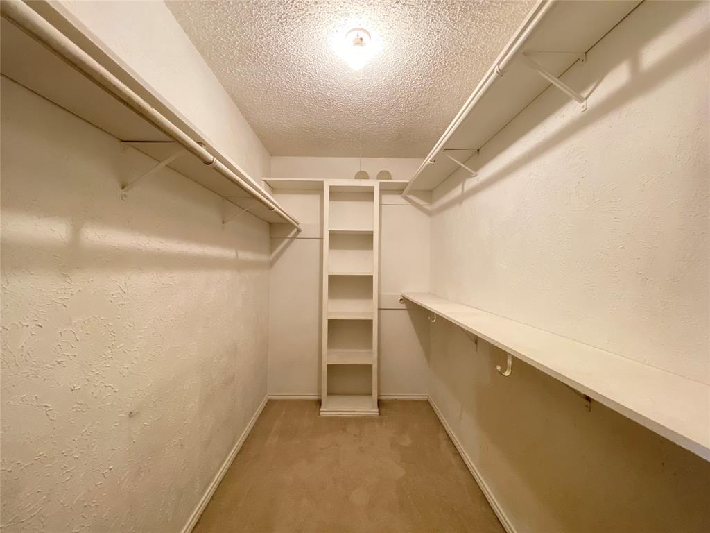 606 Old Country Road Duncanville, TX 75137 - Photo 14 of 22 a view of an empty walk in closet