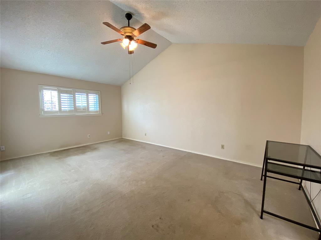 606 Old Country Road Duncanville, TX 75137 - Photo 16 of 22 an empty room with windows and fan