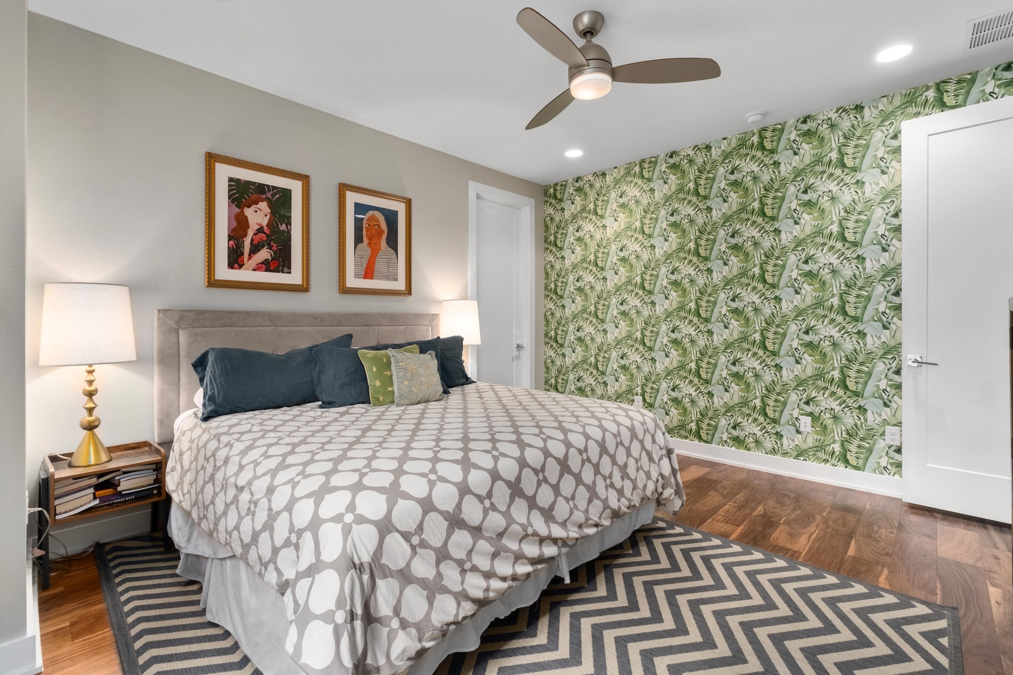 3302 Funston Street Austin, TX 78703 - Photo 14 of 35 Bedroom featuring wood finished floors, wallpapered walls, ceiling fan, and recessed lighting