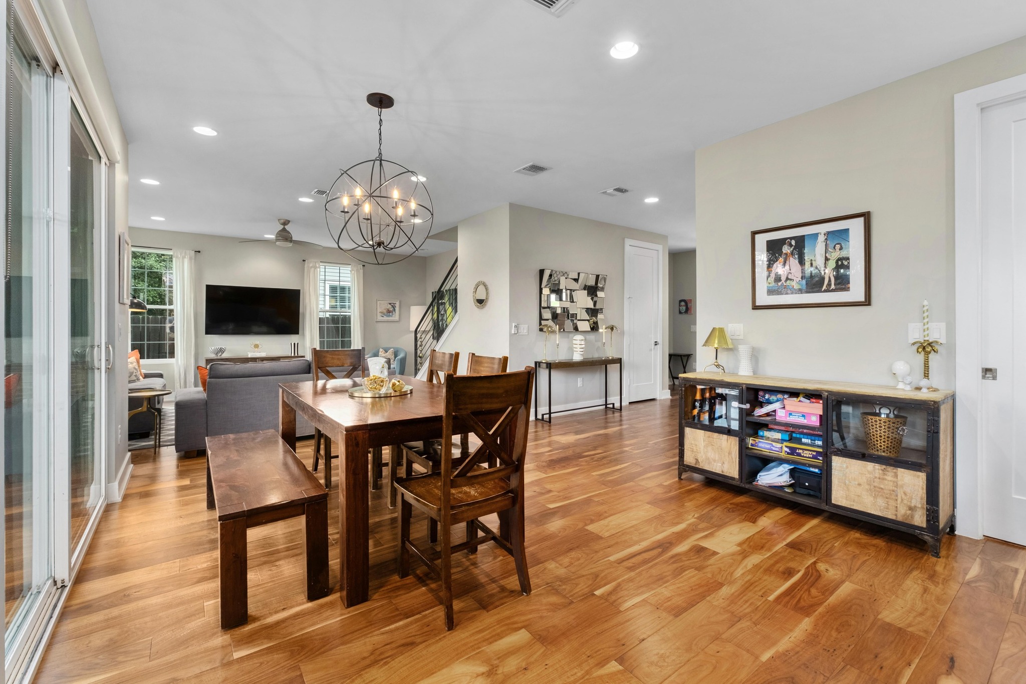 3302 Funston Street Austin, TX 78703 - Photo 8 of 35 Dining room featuring recessed lighting, a chandelier, and light wood-style flooring