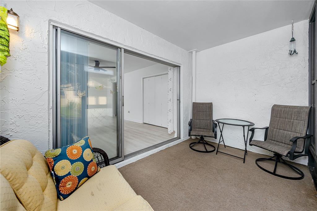 2207 Belleair Road, Unit B4 Clearwater, FL 33764 - Photo 20 of 37 a bedroom with a bed and furniture