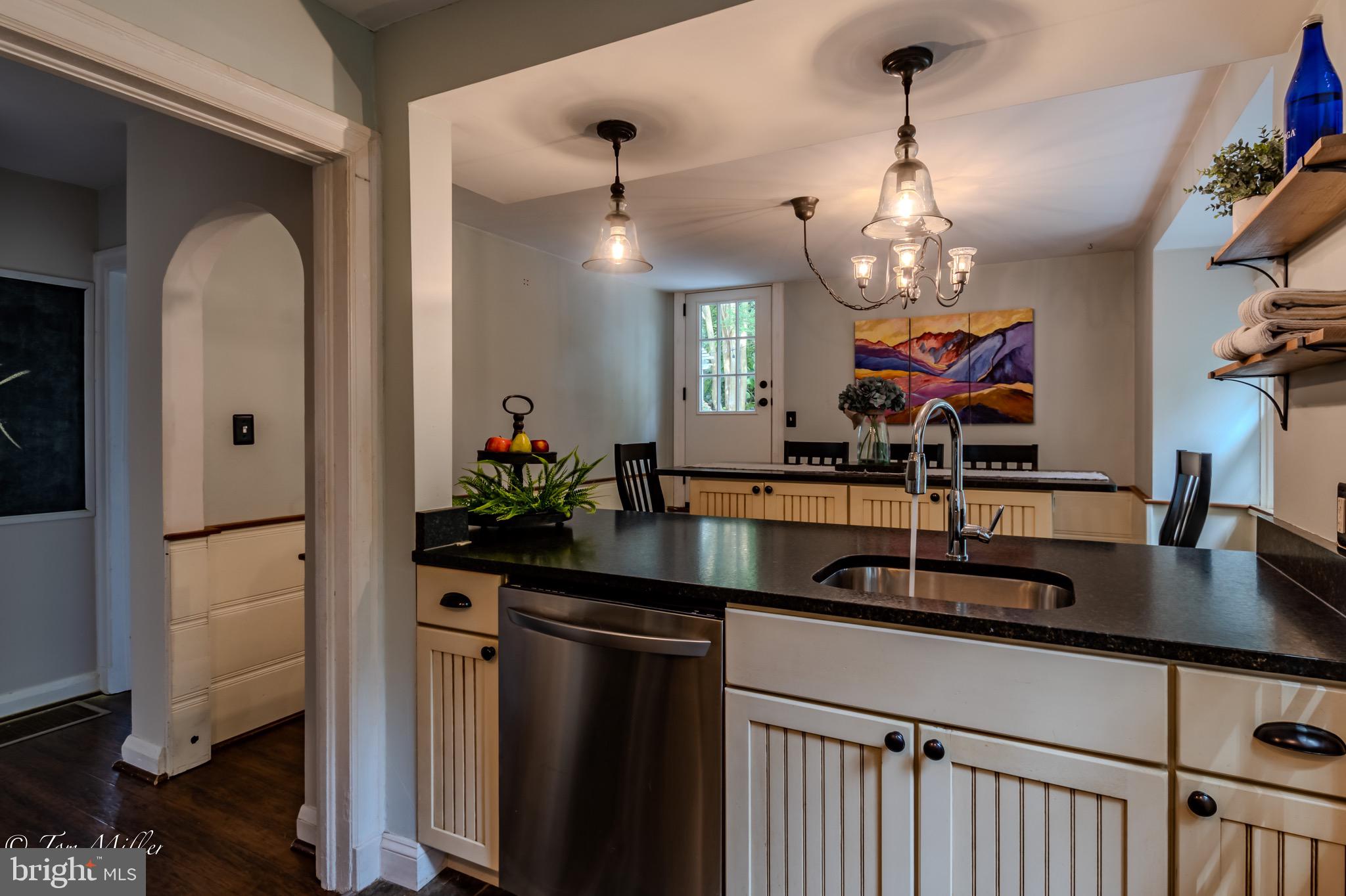 5815 Lochlea Road Baltimore, MD 21209 - Photo 11 of 40 a kitchen with a sink and refrigerator