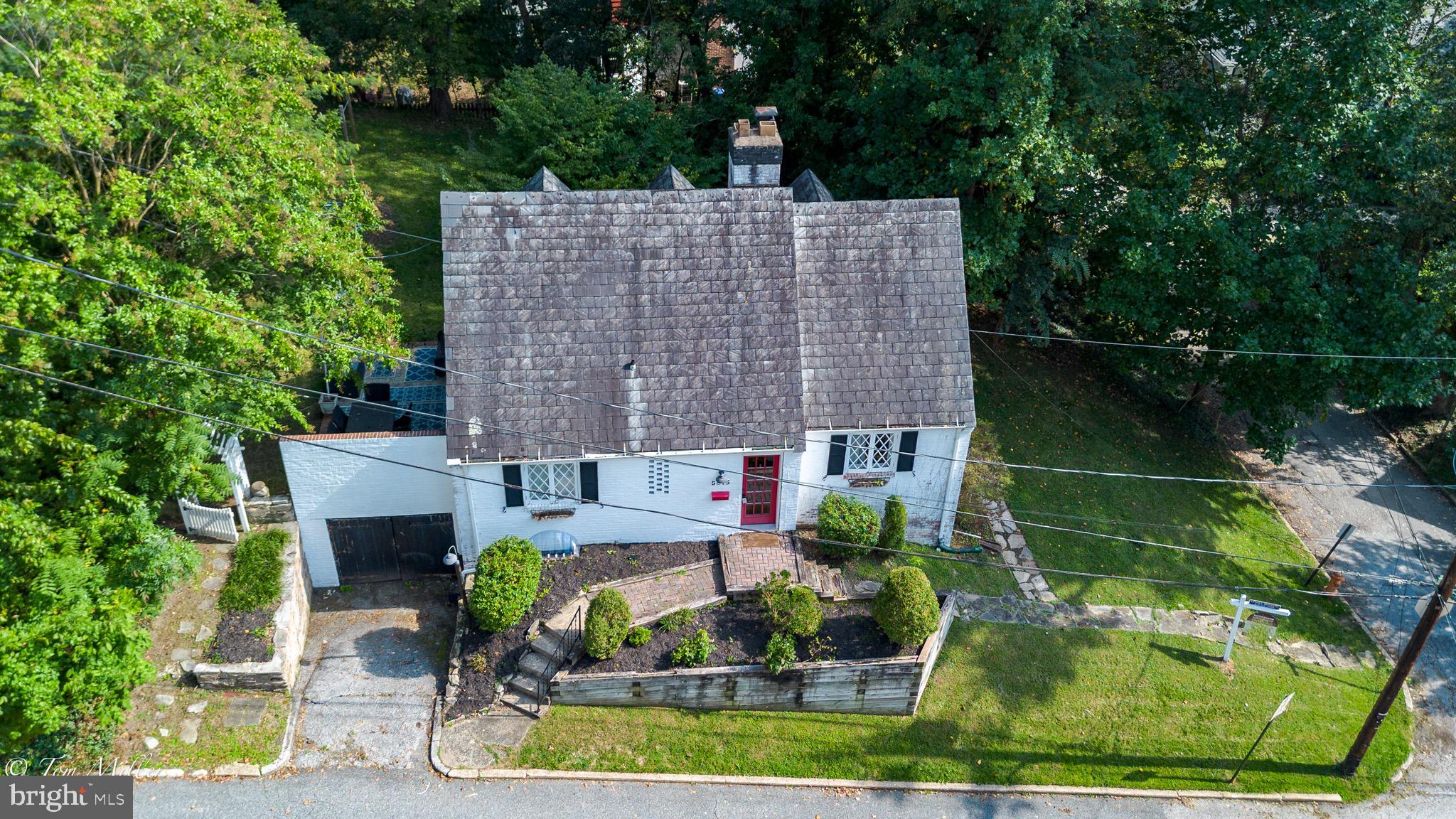 5815 Lochlea Road Baltimore, MD 21209 - Photo 30 of 40 an aerial view of a house with a garden and lake view